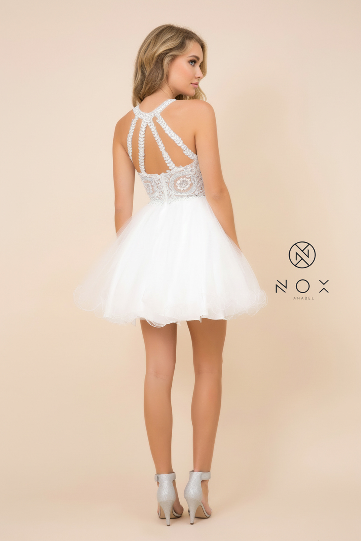 Fabulous cocktail dress featuring a flattering halter top design — Nox Anabel B652