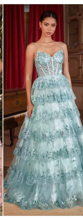 Tiered gown elongating petite body types